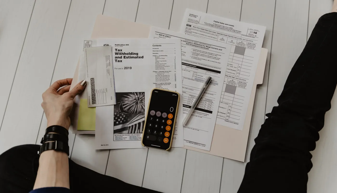 Desk papers and figures — financial advisory coordination
