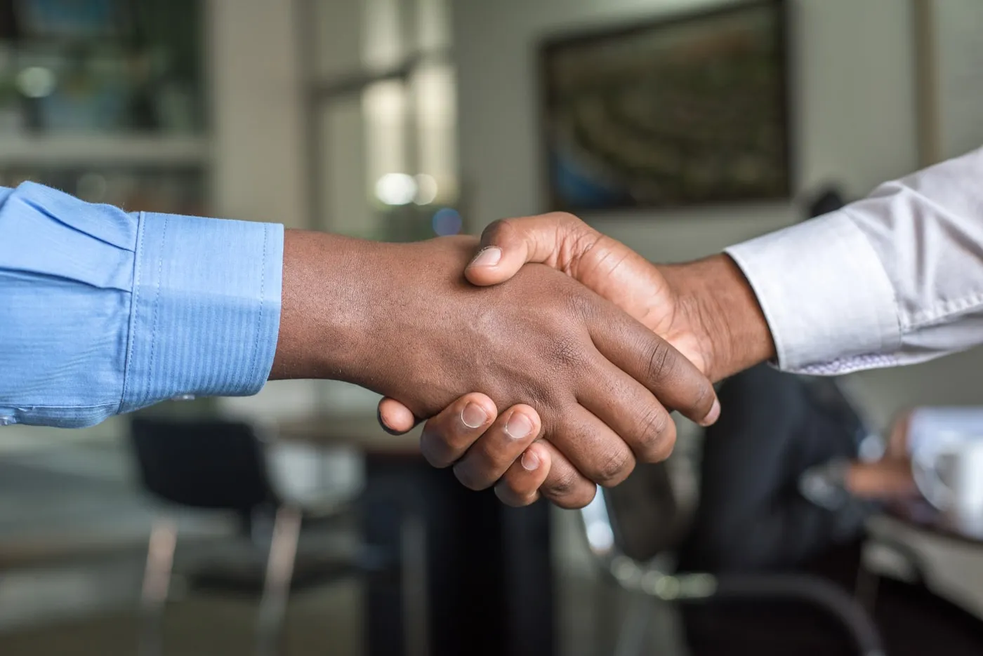 Professional handshake — directorship and fiduciary appointment